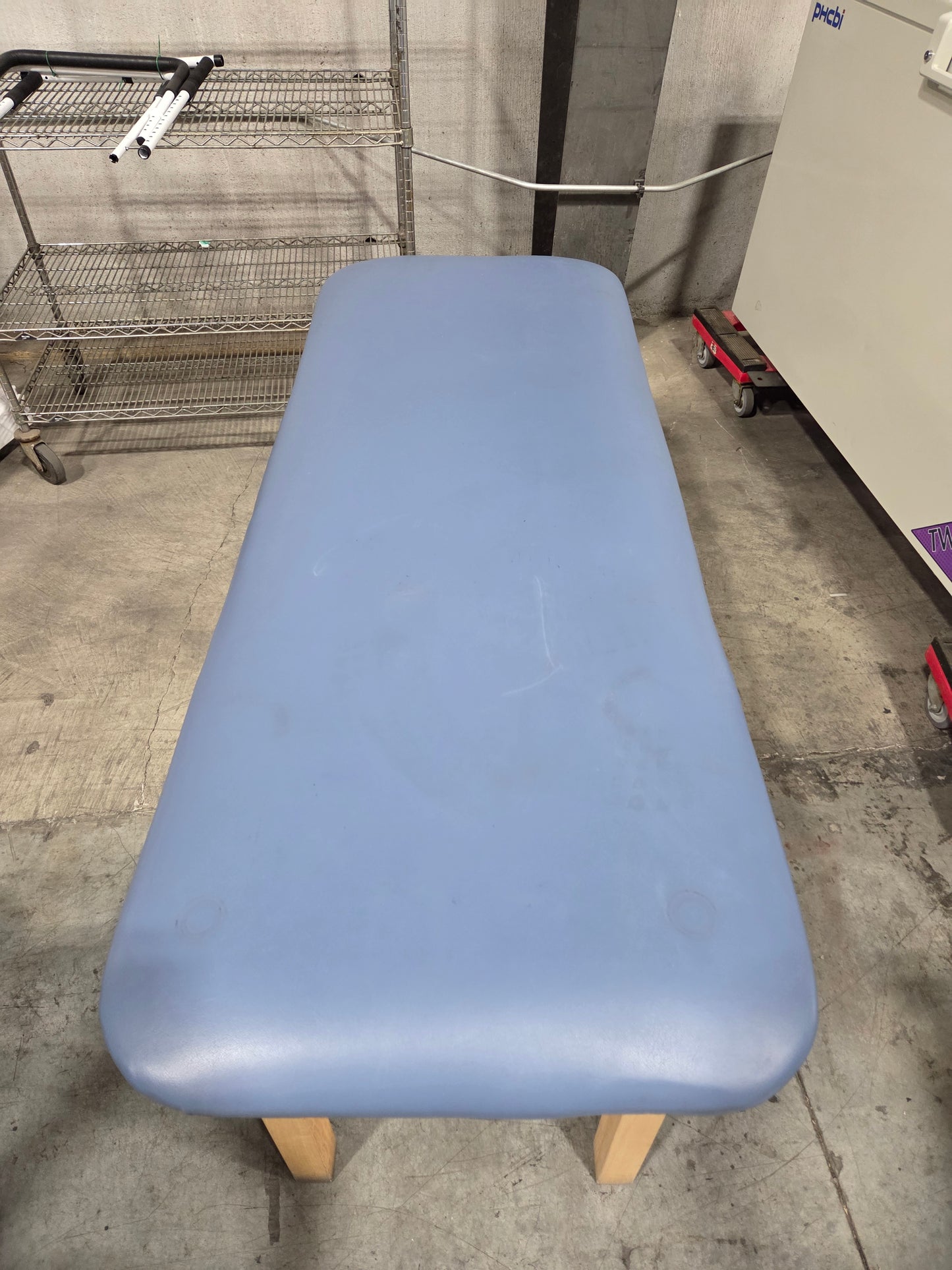 Treatment Table, Light Blue, Non-Adjustable, Used, 1/Each -1767740